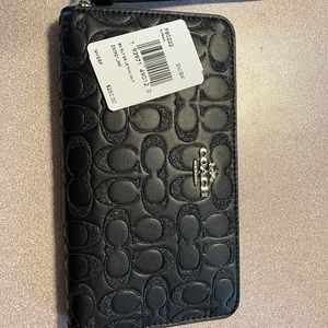 Brand new - Black Coach cell phone wallet-